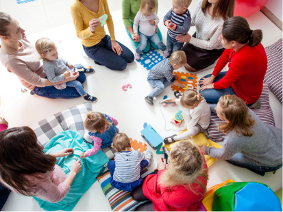 Kids playing in a circle on the floor